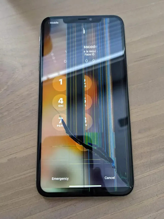 Damaged iPhone screen before repair